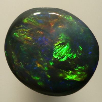 SOLID BLACK OPAL Bright flashes of green and orange